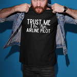 Load image into Gallery viewer, a man holding up a t - shirt that says trust me i'm an