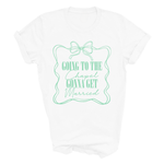 Load image into Gallery viewer, A white short-sleeve crewneck t-shirt with a mint green graphic on the front. The graphic features a decorative wavy border, a bow illustration at the top, and the text 'GOING TO THE Chapel GONNA GET Married' in a mix of serif and cursive fonts.