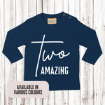 Load image into Gallery viewer, a blue shirt with two amazing words on it