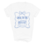 Load image into Gallery viewer, A white short-sleeve crewneck t-shirt with a blue graphic print on the front. The graphic features a decorative border, a bow illustration, and the text 'GOING TO THE Chapel GONNA GET Married' in a mix of serif and cursive fonts.