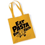 Load image into Gallery viewer, A mustard tote bag with black printed text reading 'EAT PASTA RUN FASTA' and a small cartoon pasta character, shown on a white background.