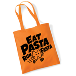 Load image into Gallery viewer, An orange tote bag with black printed text reading 'EAT PASTA RUN FASTA' and a cartoon pasta character running, shown on a white background.