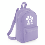 Load image into Gallery viewer, a purple backpack with a white dog paw on it