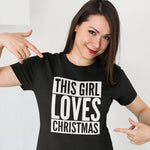 Load image into Gallery viewer, Woman pointing at her black This Girl Loves Christmas T-shirt with white print
