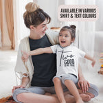 Load image into Gallery viewer, a woman sitting on the floor holding a little girl