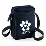 Load image into Gallery viewer, a blue bag with a paw print on it