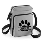 Load image into Gallery viewer, a grey bag with a black dog paw on it