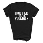 Load image into Gallery viewer, a black shirt that says trust me i'm a plumber
