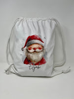 Load image into Gallery viewer, Personalised Santa Christmas drawstring bag with example name, full bag view