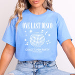 Load image into Gallery viewer, Woman wearing a carolina blue One Last Disco hen party T-shirt with white disco ball print