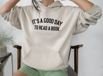 Load image into Gallery viewer, It's A Good Day To Read A Book Unisex Hooded Sweatshirt