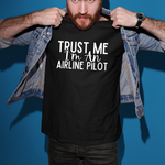 Load image into Gallery viewer, a man holding up a t - shirt that says trust me i&#39;m an
