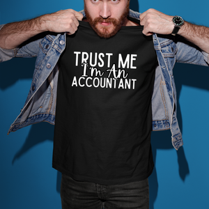 a man holding up a t - shirt that says trust me i'm an