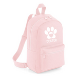 Load image into Gallery viewer, a pink backpack with a paw print on it
