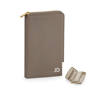 A tan leather wallet with a zipper closure and a personalized initials &quot;JD&quot; printed on it.