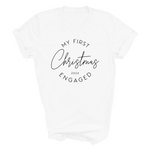 Load image into Gallery viewer, a white t - shirt that says my first christmas engaged

