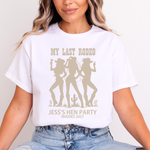 Load image into Gallery viewer, White t-shirt with 'My Last Rodeo Jess's Hen Party Rhodes 2027' design worn by a person.
