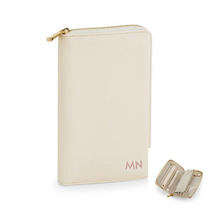 A cream-colored wallet or card holder with a zipper closure and a small compartment on the side.