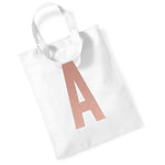Load image into Gallery viewer, White initial mini tote bag with a rose gold letter A
