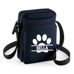 Load image into Gallery viewer, a blue bag with a paw print on it
