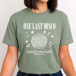 Load image into Gallery viewer, Woman wearing a sage One Last Disco hen party T-shirt with white disco ball print
