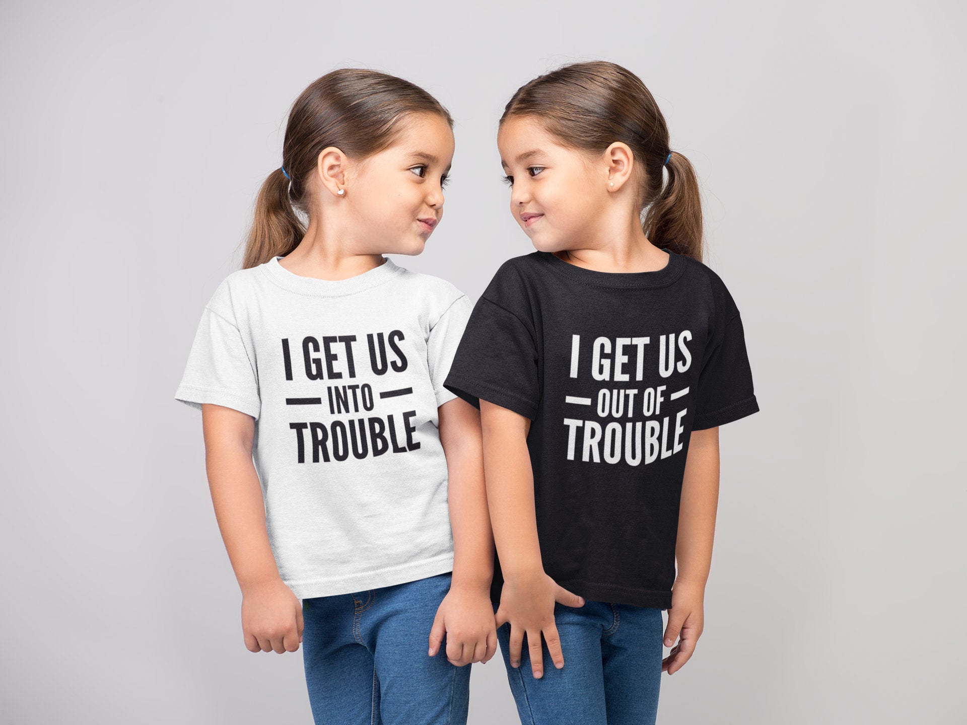 I Get Us Into/ Out Of Trouble Kids T-shirt